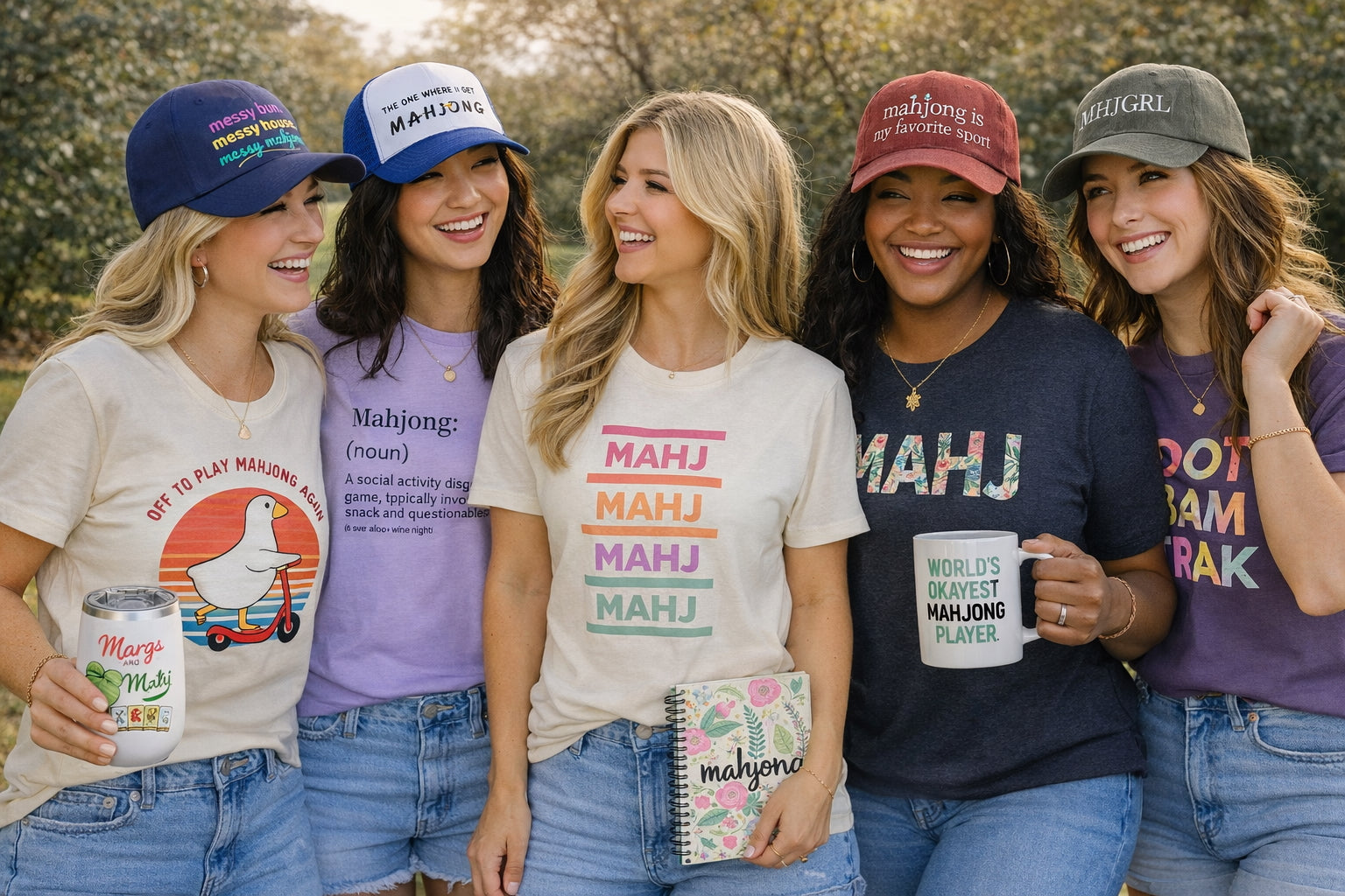 Five women wearing mahjong-themed clothing and accessories outdoors.
